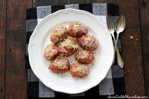 Hasselback potatoes, stuffed with salami and covered in pecorino.