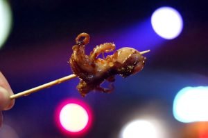 A skewer of tender barbecued baby octopus from Yurippi at The Cliff Dive