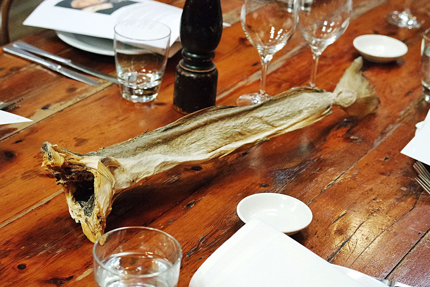 Whole Bakalar - Norwegian dried cod - sitting in the middle of the table
